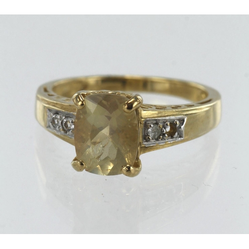 188 - 9ct yellow gold Tibetan sunstone and white topaz dress ring, one 1.503ct sunstone, four round topaz ... 