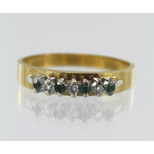 200 - Yellow gold (tests 18ct) diamond and emerald ring, three diamonds TDW approx. 0.06ct, four emeralds ... 