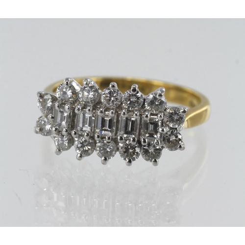 202 - 18ct yellow gold diamond mixed cut cluster ring, five baguette cuts surrounded by a halo of fourteen... 