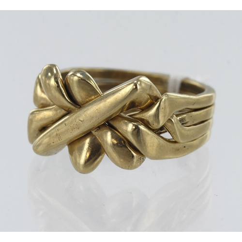 204 - 9ct yellow gold four band puzzle ring, head width 13.5mm, finger size S/T, weight 9.7g.