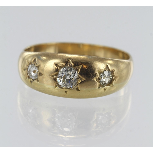 207 - Yellow gold (tests 18ct) diamond gypsy trilogy ring, three graduating old cuts, principle approx. 0.... 