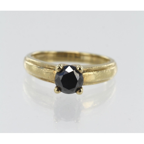 21 - 9ct yellow gold black synthetic diamond solitaire, one 6mm round brilliant cut, four claw set, finge... 