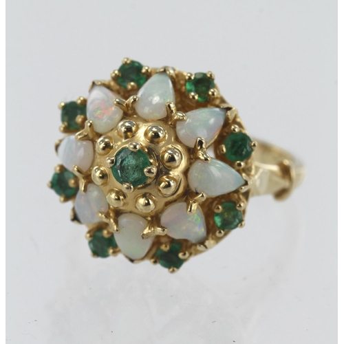 214 - 14ct yellow gold emerald and opal cluster ring, eight pear shaped cabochons approx. 5mm x 3mm, nine ... 