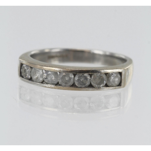 215 - 18ct white gold diamond half eternity ring, seven round brilliant cuts TDW approx. 0.70ct, channel s... 