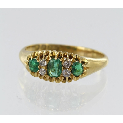 25 - 18ct yellow gold Victorian diamond and emerald ring, three graduating step cut emeralds principle me... 