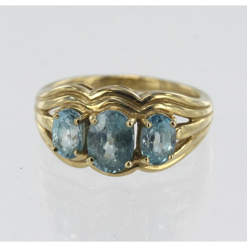 261 - 9ct yellow gold blue zircon trilogy ring, three oval Cambodian zircons TGW 2.087ct, complete with Ge... 