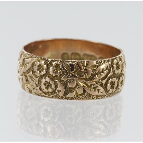 28 - 9ct yellow gold Victorian floral patterned wedding ring, width approx. 8mm, hallmarked Birmingham 18... 