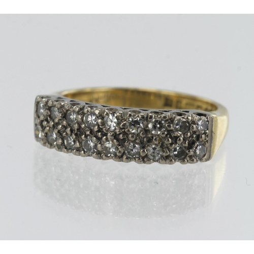 42 - 18ct yellow gold two row half eternity ring set with eighteen round brilliant cut diamonds weighing ... 