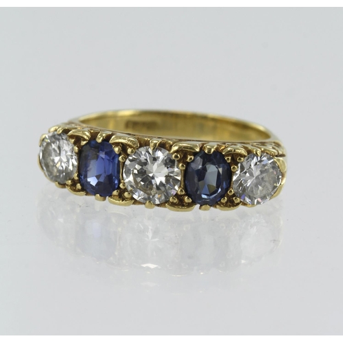 45 - Yellow gold (tests 18ct) diamond and sapphire five stone ring, two oval sapphires measuring approx. ... 