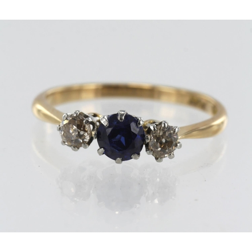 48 - Yellow gold (tests 18ct) diamond and synthetic sapphire trilogy ring, syn. sapphire measures approx.... 