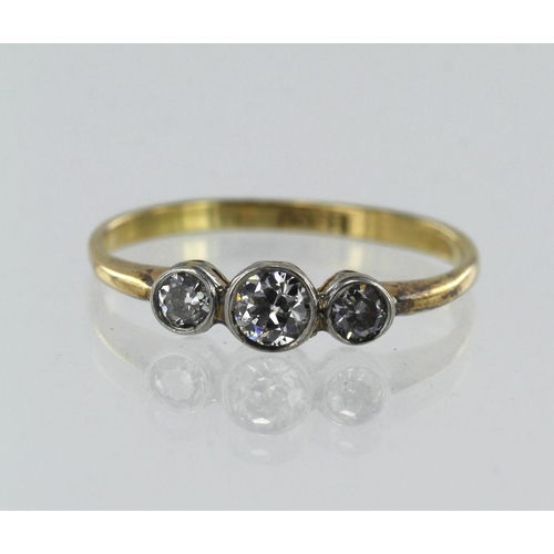 57 - Yellow gold (tests 18ct) vintage diamond trilogy ring, three graduating round brilliant cut diamonds... 