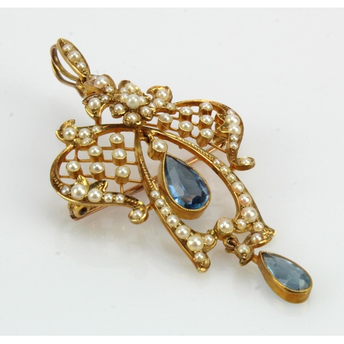 625 - Yellow gold (tests 15ct) Edwardian lavaliere pendant, set with two articulated pear shaped aquamarin... 