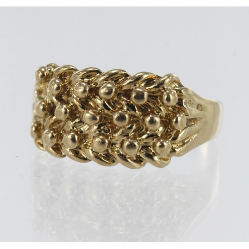 64 - 9ct yellow gold three row keeper ring, head width approx. 11mm, finger size Y/Z, weight 5.4g.