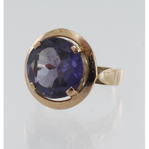 72 - Rose gold (tests 9ct) synthetic colour change sapphire dress ring, syn. sapphire measures 12mm, fing... 