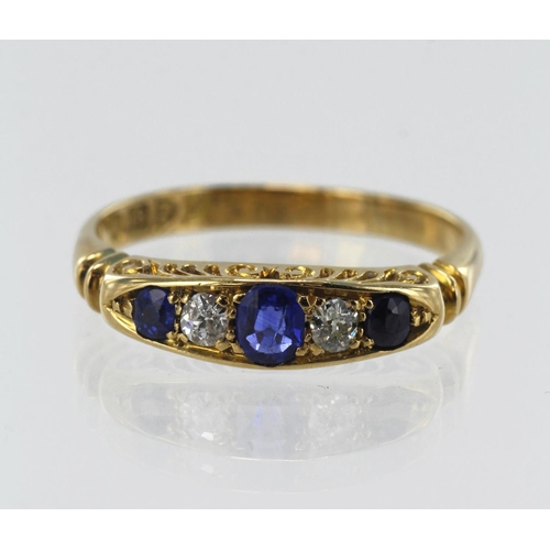 89 - 18ct yellow gold Edwardian diamond and sapphire boat shaped ring, three oval sapphire principle meas... 