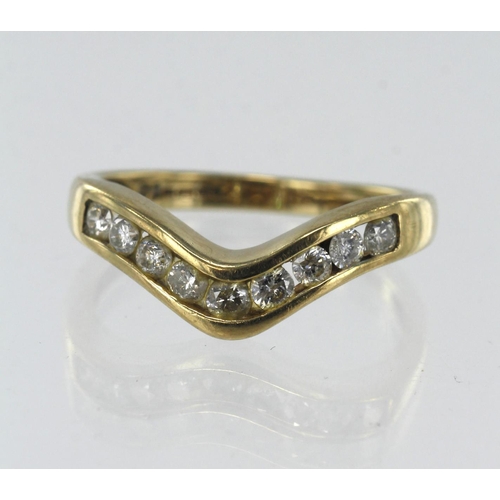 90 - 9ct yellow gold diamond wish bone ring, nine round brilliant cut diamonds TDW approx. 0.55ct, channe... 