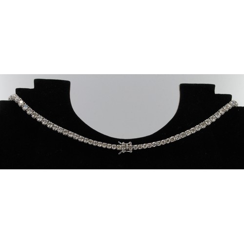 414 - White gold (tests 18ct) diamond tennis necklace, TDW approx 22ct, principal diamond approx 0.57ct, e... 