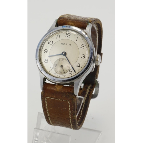 139 - Gents stainless steel cased Hefik manual wind wristwatch, circa 1950s. The two-tone silver and cream... 