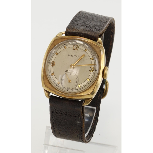 141 - Gents 9ct cased Hefik manual wind wristwatch, hallmarked 1922. The silver dial with Arabic numerals ... 