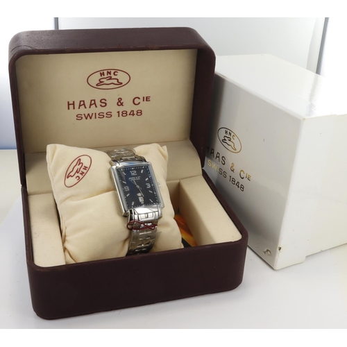 18 - Hass & Cie stainless steel cased gents quartz wristwatch. The black dial with silver Arabic numerals... 