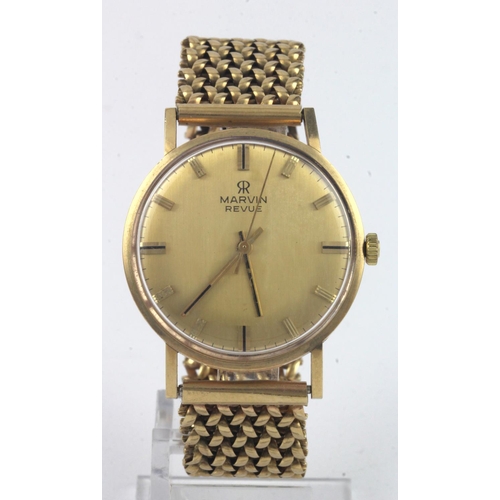 207 - Gents 9ct cased Marvin Revue manual wind wristwatch. Case diameter approx. 34mm on a 9ct bracelet ha... 