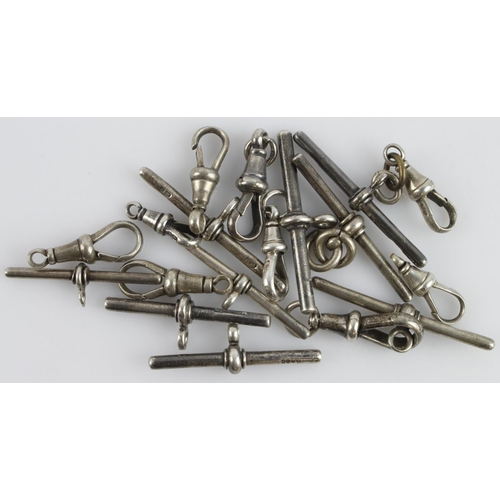 279 - Assortment of eighteen watch chain fittings and accessories, to include eight dog clips and eight T-... 