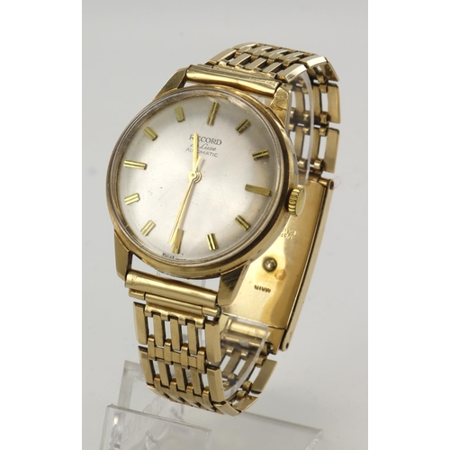 29 - Gents 9ct cased Record De Luxe Automatic wristwatch, hallmarked London 1964. The silvered dial with ... 