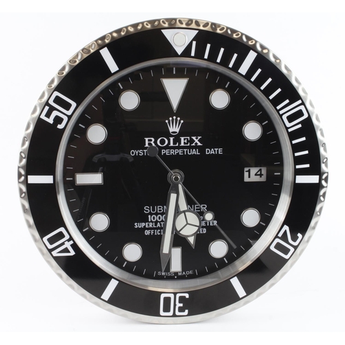 297 - Advertising Wall Clock. Black 'Rolex' style advertising wall clock, black dial reads 'Rolex Oyster P... 