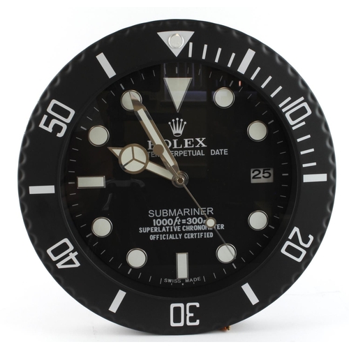 298 - Advertising Wall Clock. Matte black 'Rolex' style advertising wall clock, black dial reads 'Rolex Oy... 