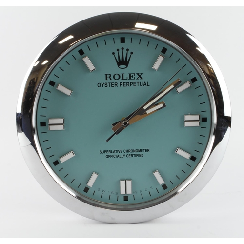 301 - Advertising Wall Clock. Silver 'Rolex' style advertising wall clock, the Tiffany dial reads 'Rolex O... 