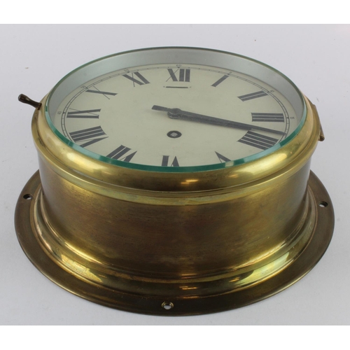 303 - Brass bulkhead clock, Roman numerals to dial, diameter 22.5cm approx. (working at time of cataloguin... 