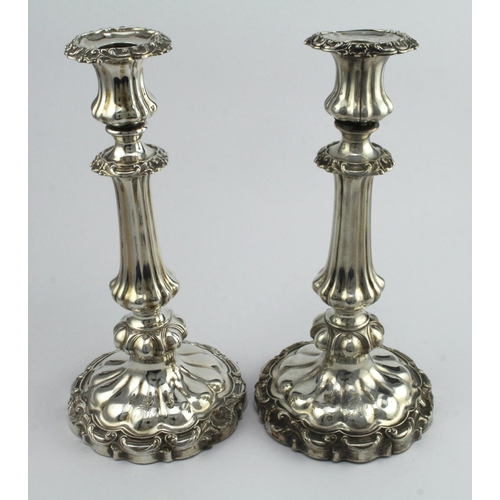 320 - Pair of William IV ornately decorated silver candlesticks, hallmarked 'TJNC, Sheffield 1832' (Creswi... 