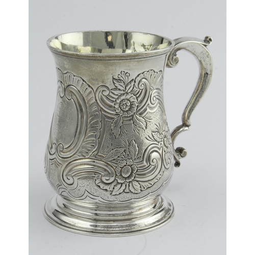 324 - George II silver one pint mug, has later embossing and chasing, hallmarked for Thomas Whipham London... 