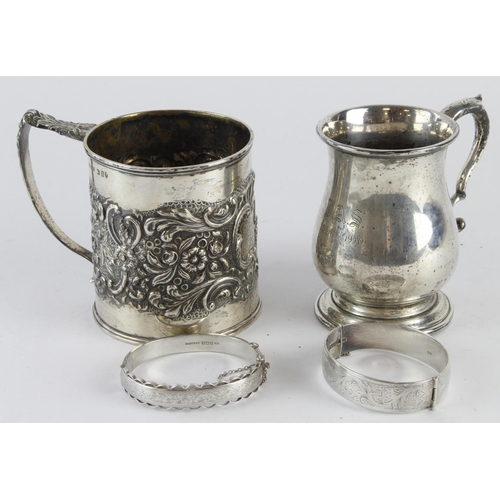 325 - Mixed Silver. Two silver cups & two silver bangles, total weight 16.oz. approx.