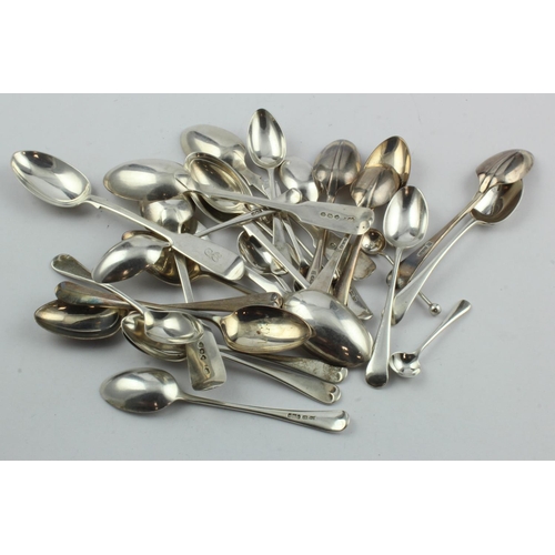 329 - Spoons. A group of approximately twenty-eight hallmarked silver teaspoons and condiment spoons, weig... 