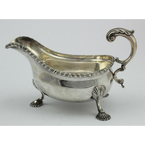 337 - Silver gravy boat, raised on three feet, hallmarked 'C.SH, London 1902' (Charles Stuart Harris), hei... 