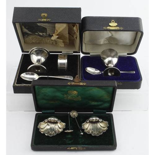 344 - Three silver boxed items, comprising two silver Christening sets, egg cup and teaspoon, and egg cup,... 