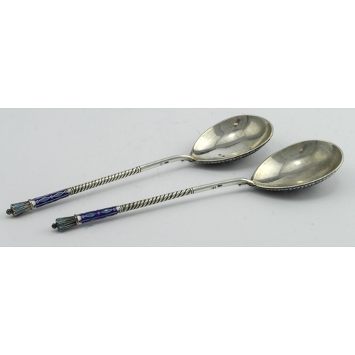 374 - Two Russian silver and enamel spoons, one has some slight enamel damage to the top of its stem, both... 