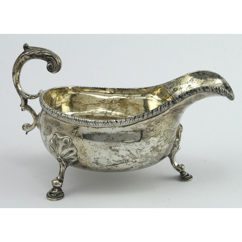 378 - Large silver gravy / sauce boat, raised on three feet, hallmarked 'APFP, London 1914' (Vander & Hedg... 