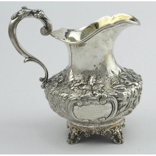 409 - William IV silver ornately decorated trophy jug, hallmarked 'RAWS, London 1836' (Richard William Atk... 