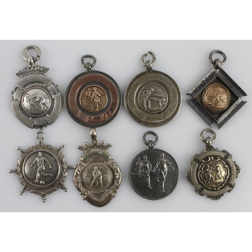 419 - Assortment of eight silver fob medals/pendants, all depict sporting events and with a full silver ha... 