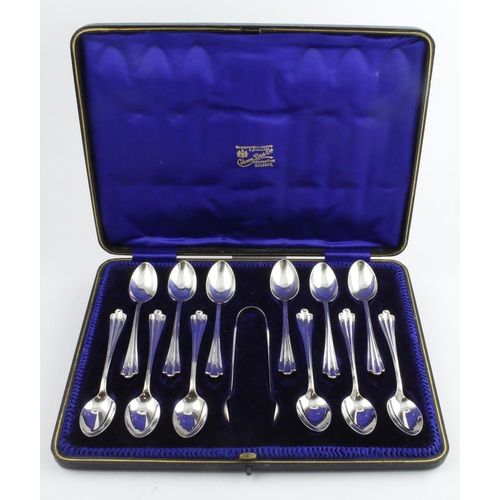 429 - Boxed set of twelve silver teaspoons and silver sugar tongs, Retailer - Cahoon Bros. Ltd., of Belfas... 