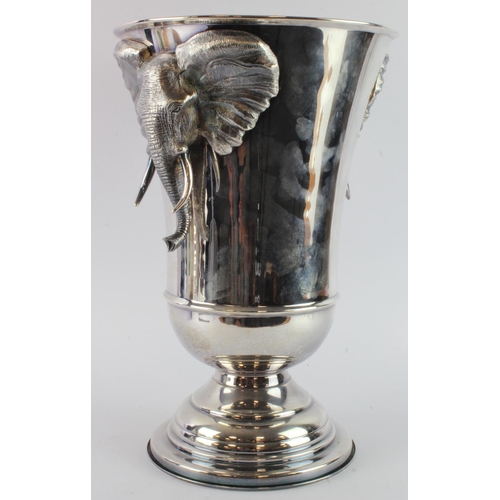 443 - Large silver plated wine bottle cooler, decorated with two elephant heads, height 38cm approx.