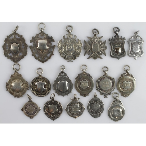 491 - Assortment of seventeen silver fob medals/pendants, all with a full silver hallmark. Gross weight 10... 