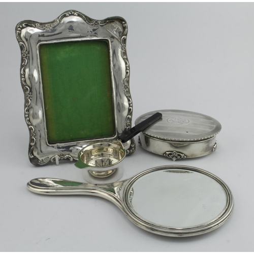 511 - Mixed lot of silver items, comprising hand mirror, photo frame (damaged), trinket box (with cut down... 