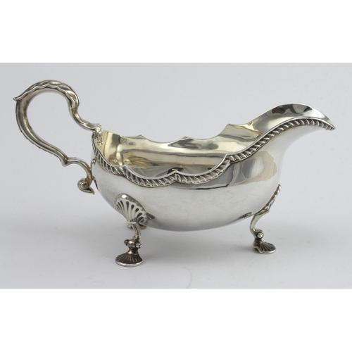 516 - Large silver sauce boat on three splay feet, very attractive and good gauge of silver, hallmarked AC... 