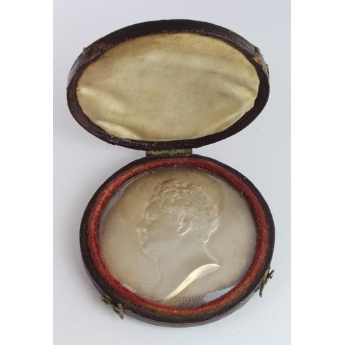 548 - White metal or possibly silver uniface plaque 47mm depicting portrait of King George IV (1820-1830) ... 