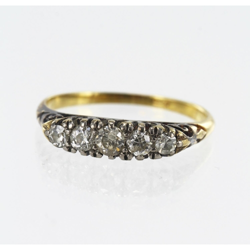 557 - Yellow gold (tests 18ct) diamond boat shaped ring, five graduating old cut and single cut diamonds, ... 