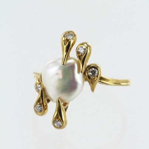 561 - Yellow gold (tests 18ct) contemporary diamond and pearl dress ring, one baroque pearl measuring appr... 