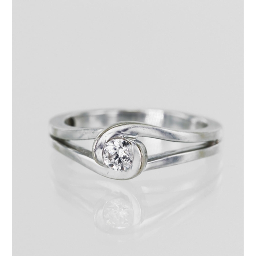 572 - White gold (tests 18ct) contemporary diamond solitaire ring, set with one round brilliant cut diamon... 